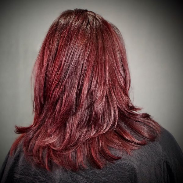 benefits-client-with-long-red-hair